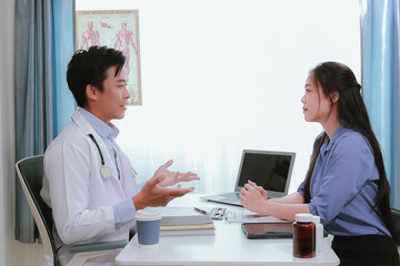 Fototapeta premium Health professionals ensure quality healthcare, discussing illnesses and examining forms for insurance and Medicare.