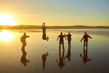 Atlantic Dawn: Tourists' Silhouette Snapshot in Essaouira