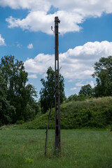 old electric pole without connected cables
