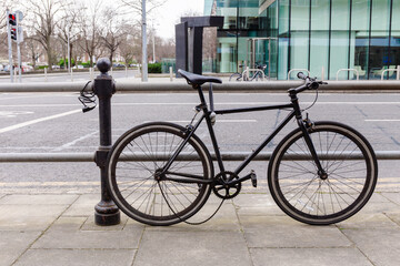 Bicycle with Slipped Chain Parked on Sidewalk
