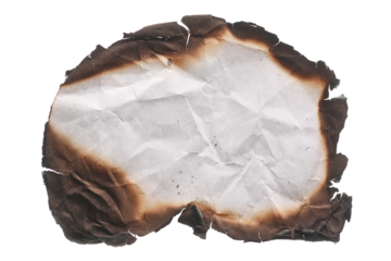 Burned and charred paper scrap, parchment isolated on white background, top view