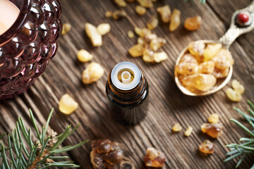 A bottle of aromatherapy essential oil with frankincense resin