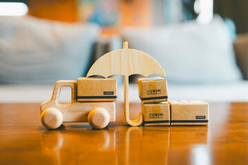 Model of a vehicle that delivers online parcels to homes, An umbrella symbol is placed, which is an...