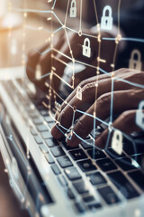 Person uses a laptop from the screen