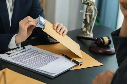 The businessman offered cash to prosecutors as a bribe to help change the verdict in the case, knowing that bribery is a serious and illegal crime. The concept of bribing government officials
