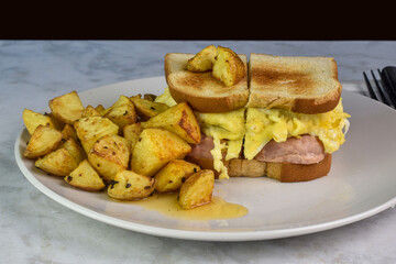 scramble egg and spam breakfast sandwich