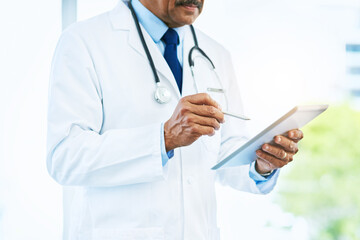 Doctor, hands and tablet for healthcare with results, online and diagnosis in clinic. Hospital,...