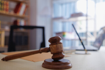 judge's gavel is placed on a table in the legal counsel's office and is often used before verdicts are read to plaintiffs and defendants in court. Legal Counsel Office Decoration Idea with Judge gavel