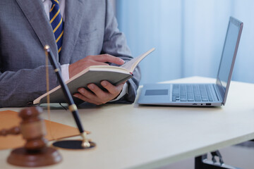 client meets with a lawyer within the legal counsel office to request advice about law and lawsuit that will be filed in order to obtain an advantageous outcome in lawsuit. legal counsel concept