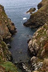 Rocky cliffs with calm sea