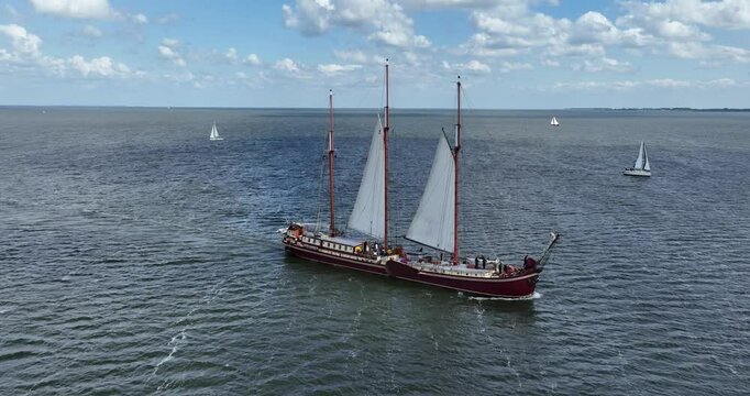 Large historic sailing ship De Radboud on the open water of the Ijsselmeer, The Netherlands.