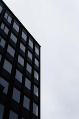 High-Rise Building Under Overcast Sky
