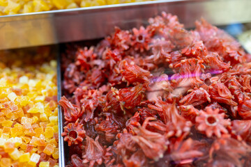 Dried hibiscus flowers on a market. Healthy and food concept. Roselle fresh. Alternative Medicine Drinks
