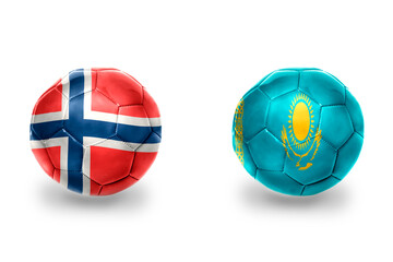 Fototapeta premium football balls with national flags of kazakhstan and norway ,soccer teams. on the white background.