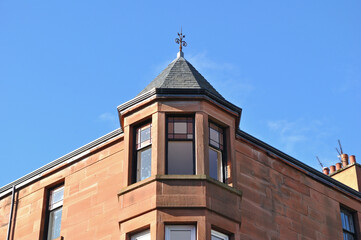 Octagonal Corner Turret on Stone Tenement Building seen from Below 