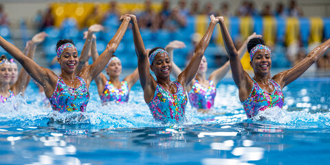 Synchronized swimming team, wide banner