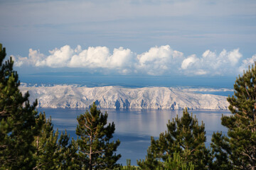 View from the mainland to the island of Krk in the morning light.
