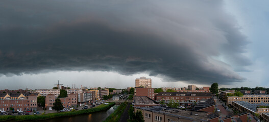 Shelf cloud over city