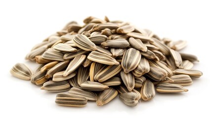 close up side view on sunflower seed pile heap on white background
