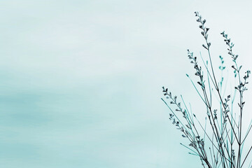 Silhouettes of grass stalks against a soft green sky. Concept of nature, simplicity, and tranquility.