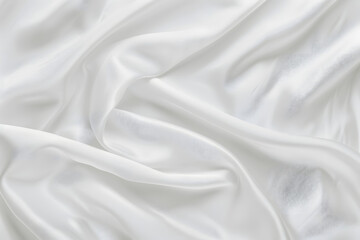 Obraz premium Luxury cloth texture with white fabric of silk for backdrop, wedding background. Seamless pattern of satin cotton.