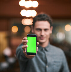Man, hand and phone with green screen for internet research, website mockup and brewery promotion. Entrepreneur guy, chroma key and mobile with advertising space, communication and distillery review