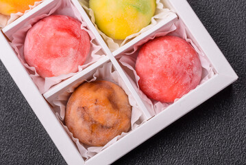 Delicious colorful asian mochi sweets with rice dough shell