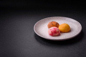 Delicious colorful asian mochi sweets with rice dough shell