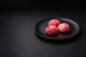 Delicious colorful asian mochi sweets with rice dough shell