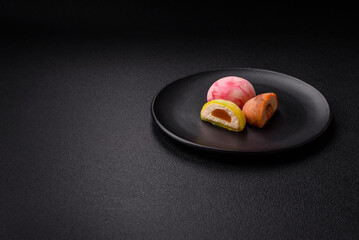 Delicious colorful asian mochi sweets with rice dough shell