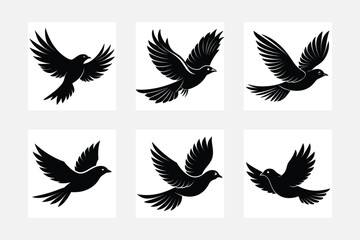 set of silhouettes of wings
