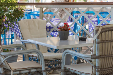 Stool and chairs in a restaurant on the island of Thassos