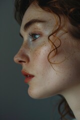 Fototapeta premium Woman with freckles close-up
