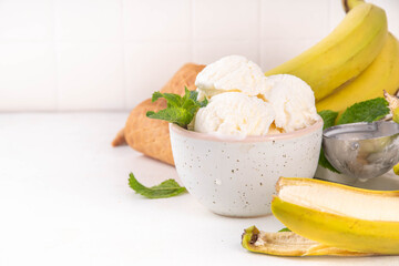 Vegan raw alternative banana ice cream,  frozen banana cream, sorbet or gelato with fresh bananas,...