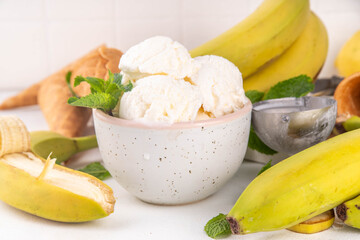 Vegan raw alternative banana ice cream,  frozen banana cream, sorbet or gelato with fresh bananas,...