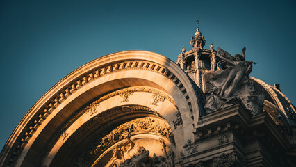 Golden Elegance: A Majestic Architectural Marvel at Sunset in paris at golden hour