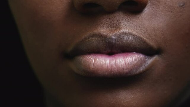 Macro Close-Up of a Black Girl's Mouth and Lips. African descent person anatomy facial body part