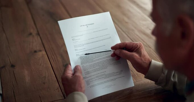 Senior man, table and application form in nursing home for agreement and consent approval. Retirement, pensioner and contract or paperwork with information, rules and registration for accommodation