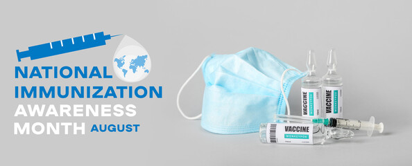 Ampules of monkeypox vaccine and medical mask on grey background