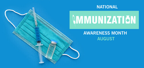 Medical syringe with medicine, mask and ampoule on blue background