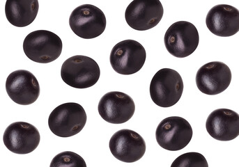 Many acai berries falling on white background