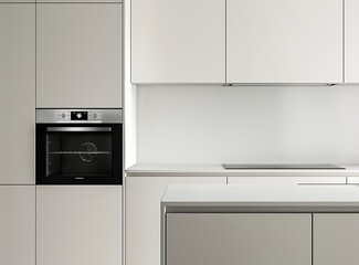 The interior of a modern kitchen in white and beige colors, with an empty counter and a built-in oven on the left side