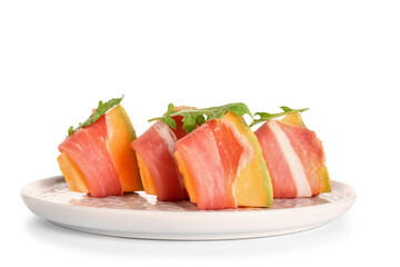 Plate of delicious melon with prosciutto and arugula on white background