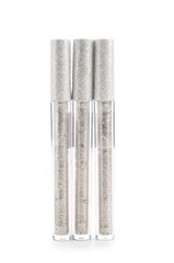 Modern silver mascara on white background