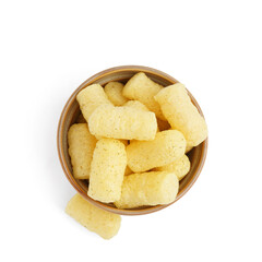 Bowl with tasty corn sticks on white background