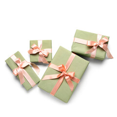 Green gift boxes on white background. International Women's Day