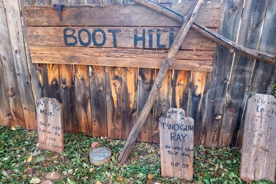 Kanab, Utah, USA - November 24, 2023: Boot Hill Graveyard Cemetery Tombstones,  Little Hollywood Museum and Trading Post Backyard Western Movie Stage Replica