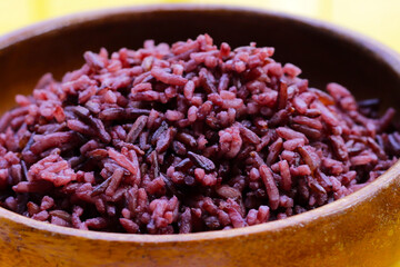 Cooked black berry rice in bowl