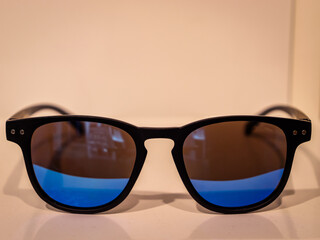 Sunglasses and glasses sale concept. Trendy sunglasses background. Trendy Fashion summer accessories. Copy space for text. Summer sale.