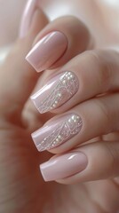 Elegant minimalist nail art. Neutral nails with delicate gold pattern accents